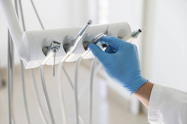 Professional Invisalign Clear Aligners technician working in Fate, TX